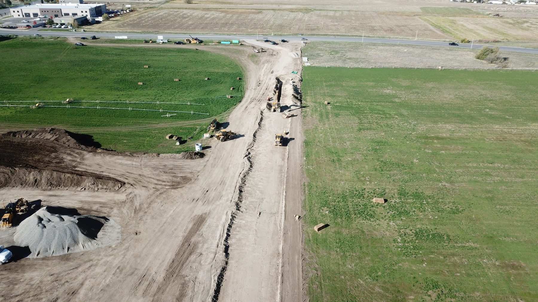 Aerial view of utility trenching and road grading along the new Payson Central access corridor
